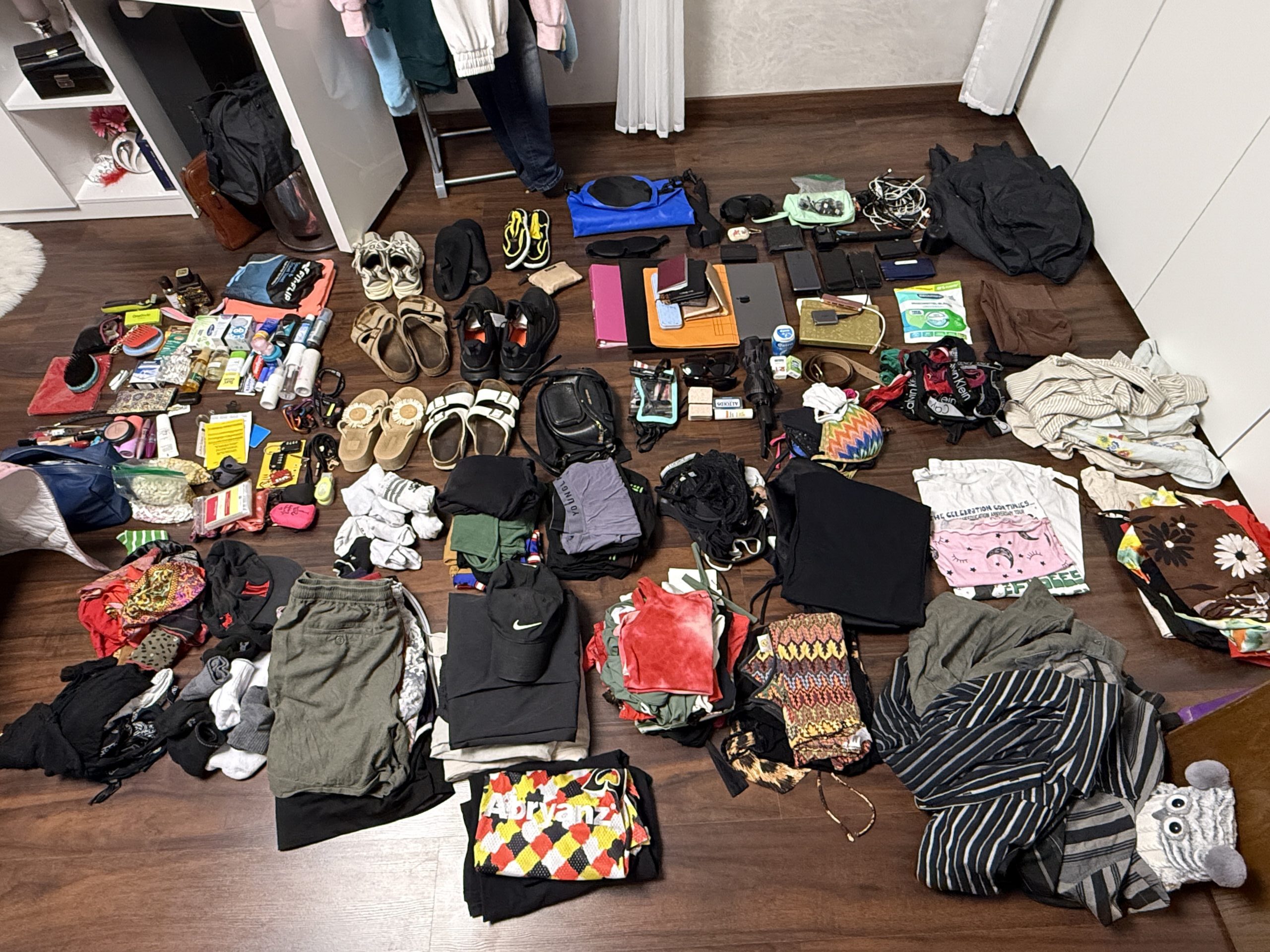 Everything laid out before packing for a trip